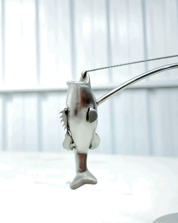 🎣Skulpturen "Fiskaren balanserar"